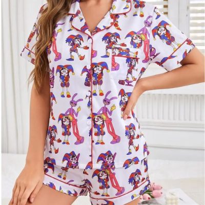 Women's 2-piece collared pajama set with The Amazing Digital Circus cartoon clown prints, fun quirky anime style, red contrast piping. Lapel top with pocket, soft elastic shorts, all-season casual loungewear for women